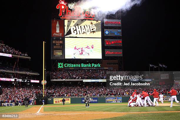 The Philadelphia Phillies pile on top of closing pitcher Brad Lidge after they won 4-3 to win the World Series against the Tampa Bay Rays during the...