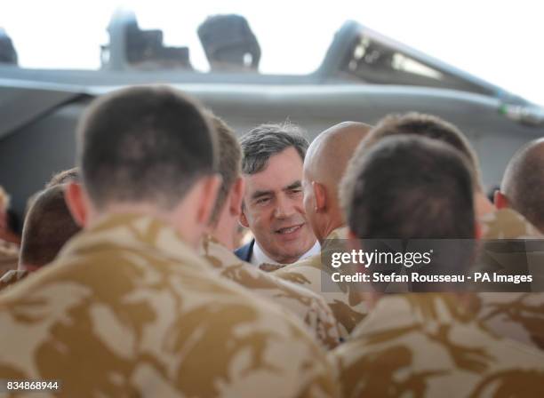 Prime Minister Gordon Brown addresses British forces at Al Udeid air base in Qatar.
