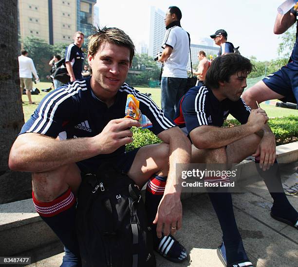 Cory Jane and Conrad Smith of the All Blacks cool off following an All Blacks training session held at Victoria Park October 30, 2008 in Hong Kong,...