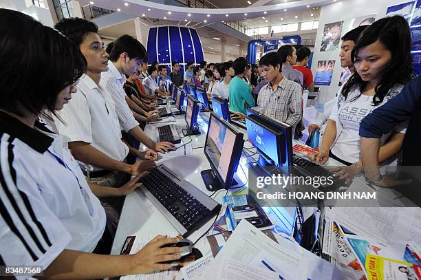 Youngsters surf free-of-charge Internet at the IT Week show being held in Hanoi on October 30, 2008. Computing and information technology is a...