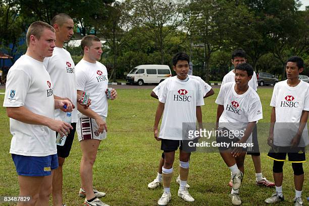 Toby Arnold far left of the HSBC Penguin during the HSBC Coaching Clinics at the COBRA 10s' Rugby Club on October 30, 2008 in Kuala Lumpur, Malaysia....