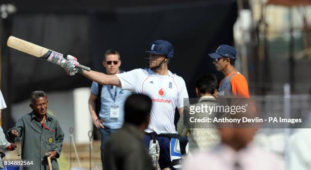 Andrew Flintoff exchanges words with Indian bowling coach Venkatesh Prasad after Andy Flower was almost hit by a ball during a training session at...