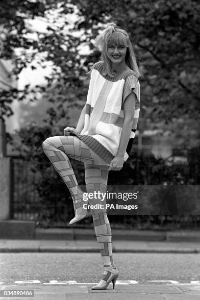 Model Maril Warne wearing "graphique" tights , a striking multi-colour printed Mondrian-inspired pattern. She was showing off the Pretty Polly Spring...