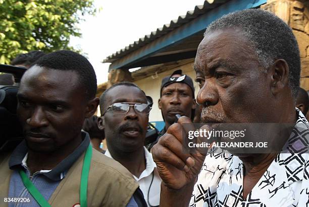 Zambia's main opposition leader Michael Sata answers journalists' questions after casting his vote in Lusaka on October 30, 2008. Zambians were...