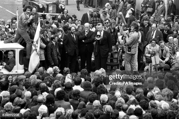 Dr Ian Paisley, gripping a loud speaker during an address to a massed gathering of supporters, in the Protestant Shankhill Road area of Belfast. The...