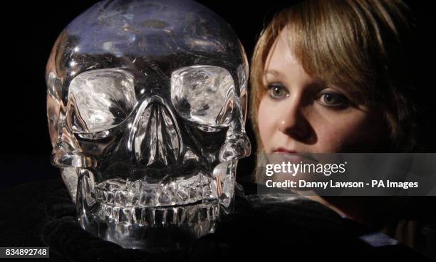 Woman views The Skull of Doom, on display at the Histories and Mysteries conference in the Hub in Edinburgh.