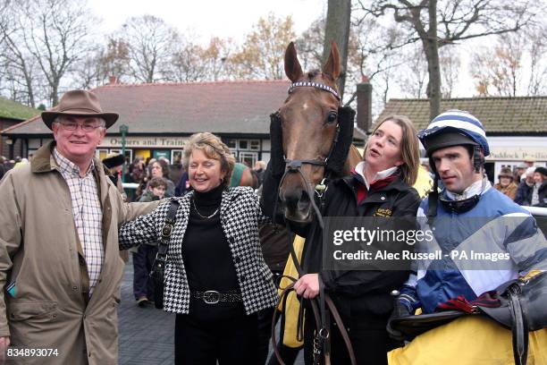 Snoopy Loopy and jockey Seamus Durack with some of owners after winning the BetFair Steeplechase during The Northwest Masters Betfair Chase at...