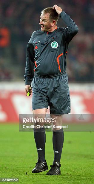 Referee Helmut Fleischer is seen during the Bundesliga match between 1. FC Koeln and Borussia Dortmund at the RheinEnergie stadium on October 29,...