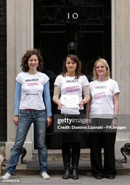 Anna Van Heeswijk, Sandrine Leveque and Bernadette Hayes - members of the Object Campaign Group - hand in a petition to 10 Downing Street calling for...