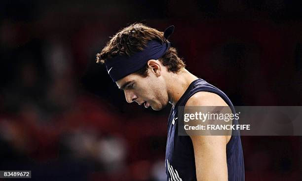 Argentina's Juan Martin Del Potro reacts after loosing a point against his compatriot David Nalbandian during their ATP Paris Indoor Masters...