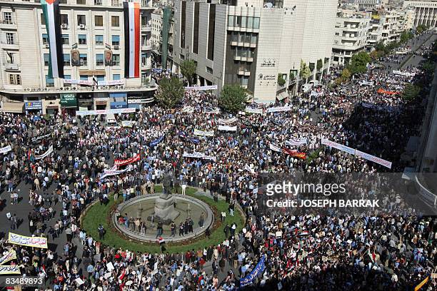 Thousands of Syrians demonstrate in Damascus on October 30, 2008 to protest a deadly US raid that targeted a Syrian village near the Iraqi border on...