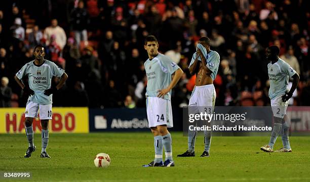 Dejected Man City players after they conceed a second goal during the Barclays Premier League match between Middlesbrough and Manchester City at the...