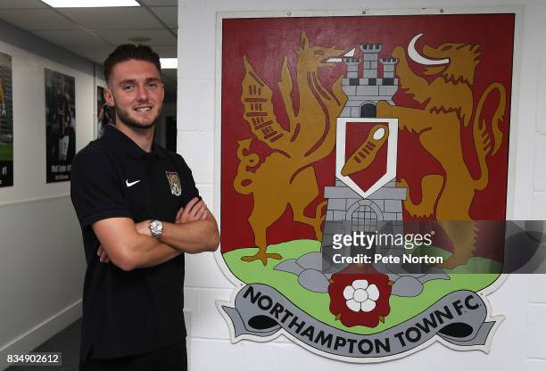 Northampton Town new signing Matt Grimes poses during a photo call at Sixfields on August 18, 2017 in Northampton, England.