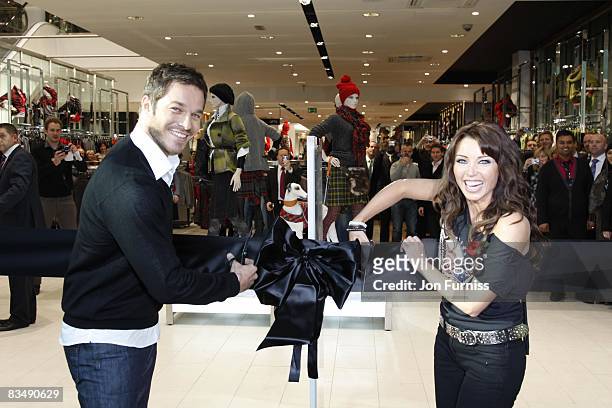 Paul Sculfor and Dannii Minogue open the Next store at the grand opening of Westfield London on October 30, 2008 in London, England.