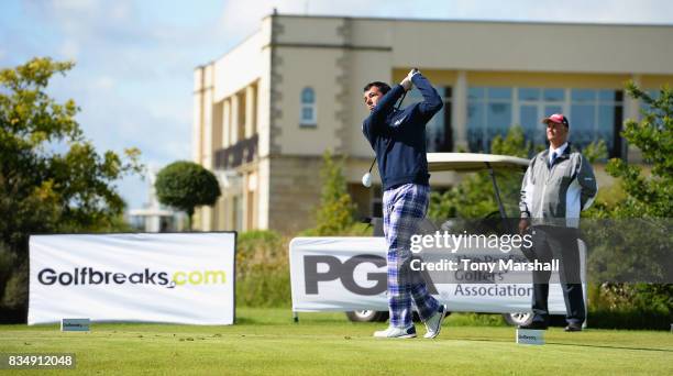 Richard O'Hanlon of St Kew Golf Club plays his first shot on the 1st tee during the Golfbreaks.com PGA Fourball Championship - Day 3 at Whittlebury...