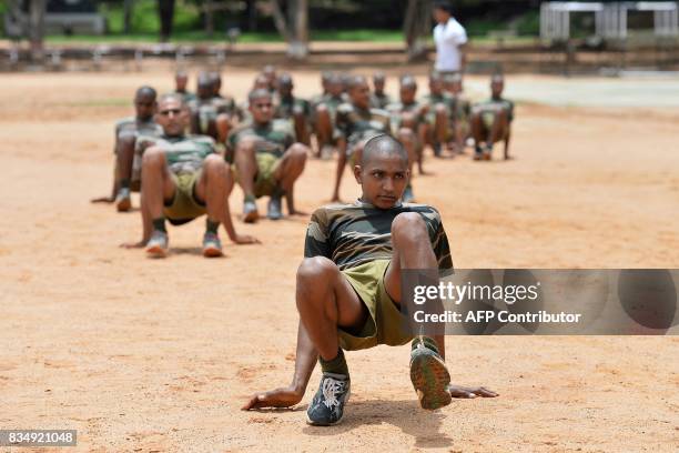 Indian trainee recruits undergo physical endurance training at the Parachute Regiment Training Centre in Bangalore on August 18, 2017. Para is a...