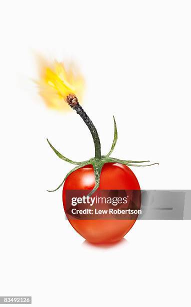 cherry tomato bomb - fuse stock pictures, royalty-free photos & images