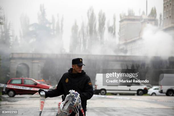 Smoke billows from a burning building at the scene of a car bomb explosion at the Navarra University on October 30, 2008 in Pamplona, Spain. The...