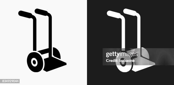 moving carriage icon on black and white vector backgrounds - movers stock illustrations