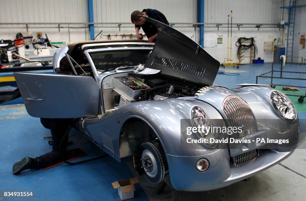 Work is carried out on a Morgan Aero 8.