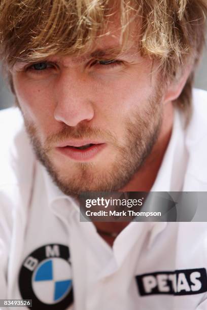 Nick Heidfeld of Germany and BMW Sauber is seen in the paddock during previews to the Brazilian Formula One Grand Prix at the Interlagos Circuit on...