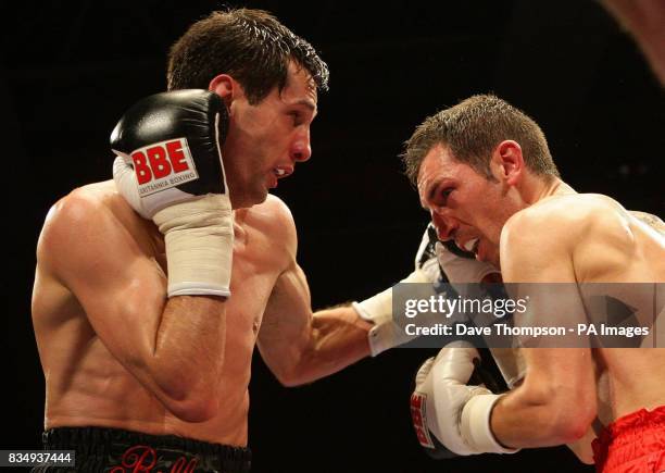 Manchester's Stephen Bell in action with Birmingham's Shaun Walton during the Super Featherweight Contest at the Kingsway Sports Centre, Widnes.