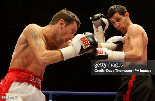 Manchester's Stephen Bell in action with Birmingham's Shaun Walton during the Super Featherweight Contest at the Kingsway Sports Centre, Widnes.
