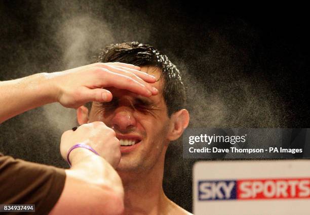Manchester's Stephen Bell is sprayed during the Super Featherweight Contest against Birmingham's Shaun Walton at the Kingsway Sports Centre, Widnes.