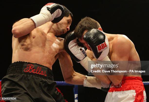 Manchester's Stephen Bell in action with Birmingham's Shaun Walton during the Super Featherweight Contest at the Kingsway Sports Centre, Widnes.