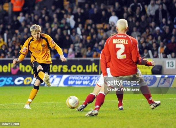 Wolves's Andy Keogh has a shot on the Barnsley goal during the Coca-Cola Championship match at Molineux Stadium, Wolverhampton.