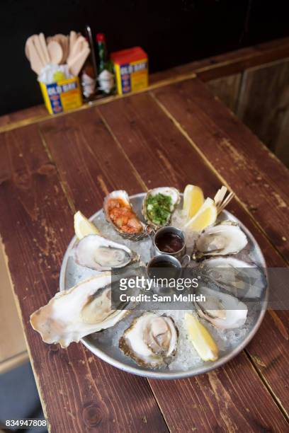 Seafood platter on wooden table in Temple Bar on 3rd April 2017 in Dublin, Republic of Ireland. Dublin is the largest city and capital of the...