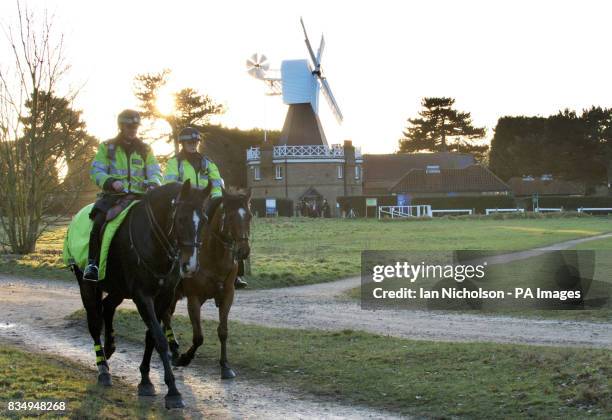 Two mounted police officers ride across Wimbledon Common in London, close to the place where former model and young mother Rachel Nickell was...