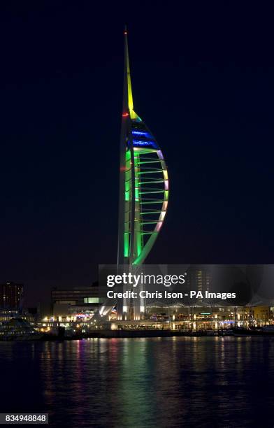 The Spinnaker Tower stands like a huge Christmas tree over Portsmouth Harbour in Hampshire, as the lights of the tower have been reset to give it a...