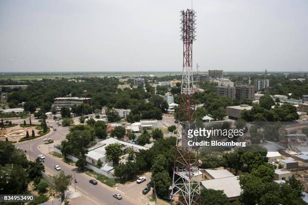 Telecommunications mast stands among residential buildings in N'Djamena, Chad, on Wednesday, Aug. 16, 2017. African Development Bank and nations...