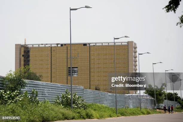 The Toumai Palace hotel stands during construction in N'Djamena, Chad, on Wednesday, Aug. 16, 2017. African Development Bank and nations signed...