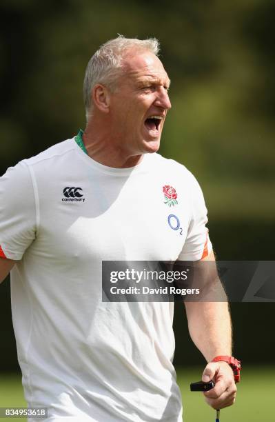 Simon Middleton, the England head coach looks on during the Women's Rugby World Cup Pool B match between England and USA at Billings Park UCB during...