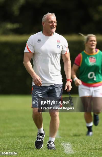 Simon Middleton, the England head coach looks on during the Women's Rugby World Cup Pool B match between England and USA at Billings Park UCB during...