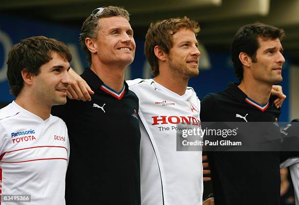 David Coulthard of Great Britain and Red Bull Racing is seen alongside Timo Glock of Germany and Toyota, Jenson Button of Great Britain and Honda...