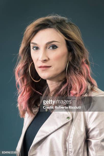 Author and journalist Juno Dawson attends a photocall during the annual Edinburgh International Book Festival at Charlotte Square Gardens on August...