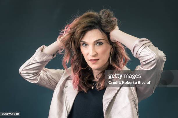 Author and journalist Juno Dawson attends a photocall during the annual Edinburgh International Book Festival at Charlotte Square Gardens on August...