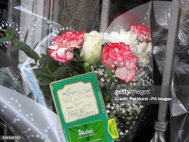 Close up view of tributes left outside the Queen Anne Hotel on Market Street in Heywood, Greater Manchester, following the death of Emma O'Kane who...