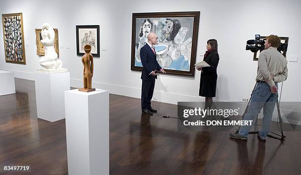 Television interview takes place in front of "Mousquetaire at femme a la fleur" by Pablo Picasso during a press preview for the Impressionist/Modern...