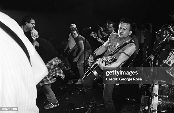 Riot on stage breaks out as the punk band "Fear" performs in a 1982 Reseda, California, concert staged at the Country Club.