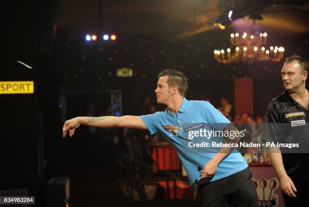 Holland's Joey Ten Berge in action against England's Marin Atkins during the World Darts Championship at Frimley Green, Surrey.