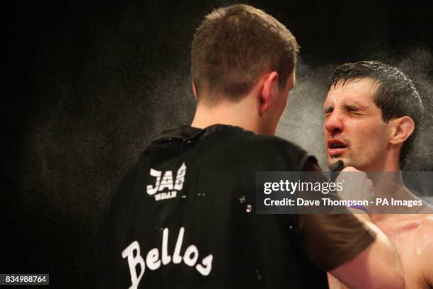 Manchester's Stephen Bell is sprayed with water during the Super Featherweight Contest against Birmingham's Shaun Walton at the Kingsway Sports...