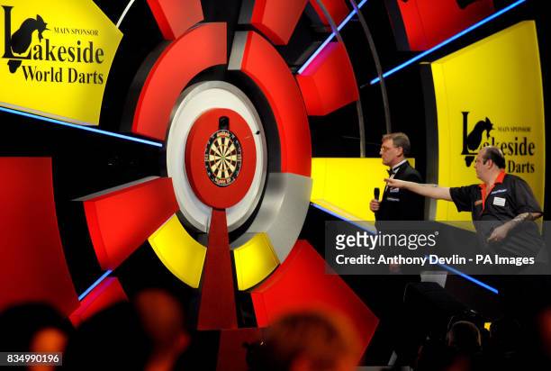 Ted Hankey in action during the World Darts Championship at Frimley Green, Surrey.
