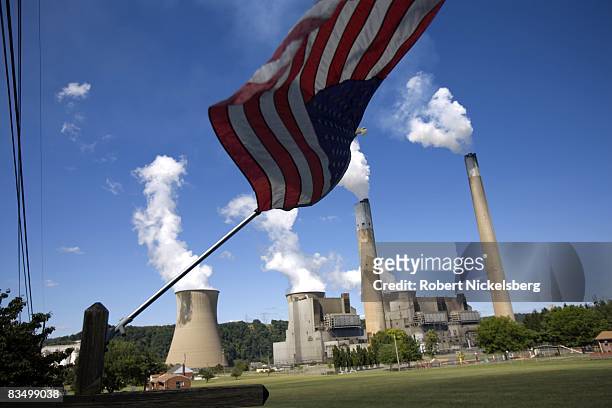Smoke and steam vapor pour out of the Bruce Mansfield Power Plant over a nearby residential area on September 10, 2008 in Shippingport, Pennsylvania....