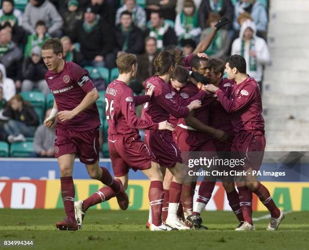 Hearts' players celebrate the first goal by Hearts striker Christian Nade during the Homecoming Scottish Cup match at Easter Road, Edinburgh.