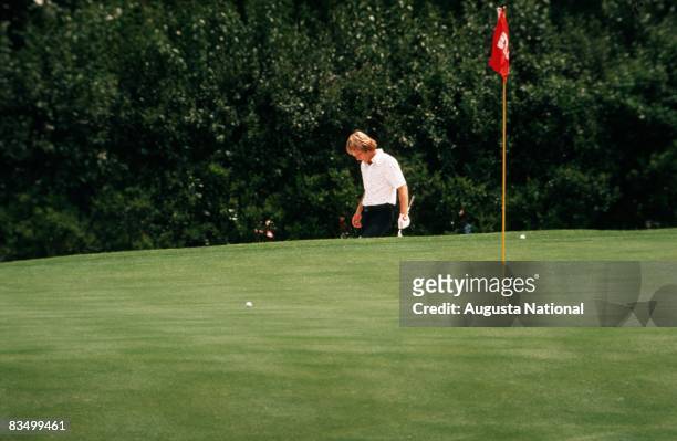Ben Crenshaw pitches to the green during the 1974 Masters Tournament at Augusta National Golf Club in April 1974 in Augusta, Georgia.