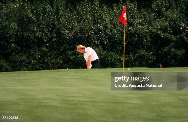 Ben Crenshaw pitches to the green during the 1974 Masters Tournament at Augusta National Golf Club in April 1974 in Augusta, Georgia.